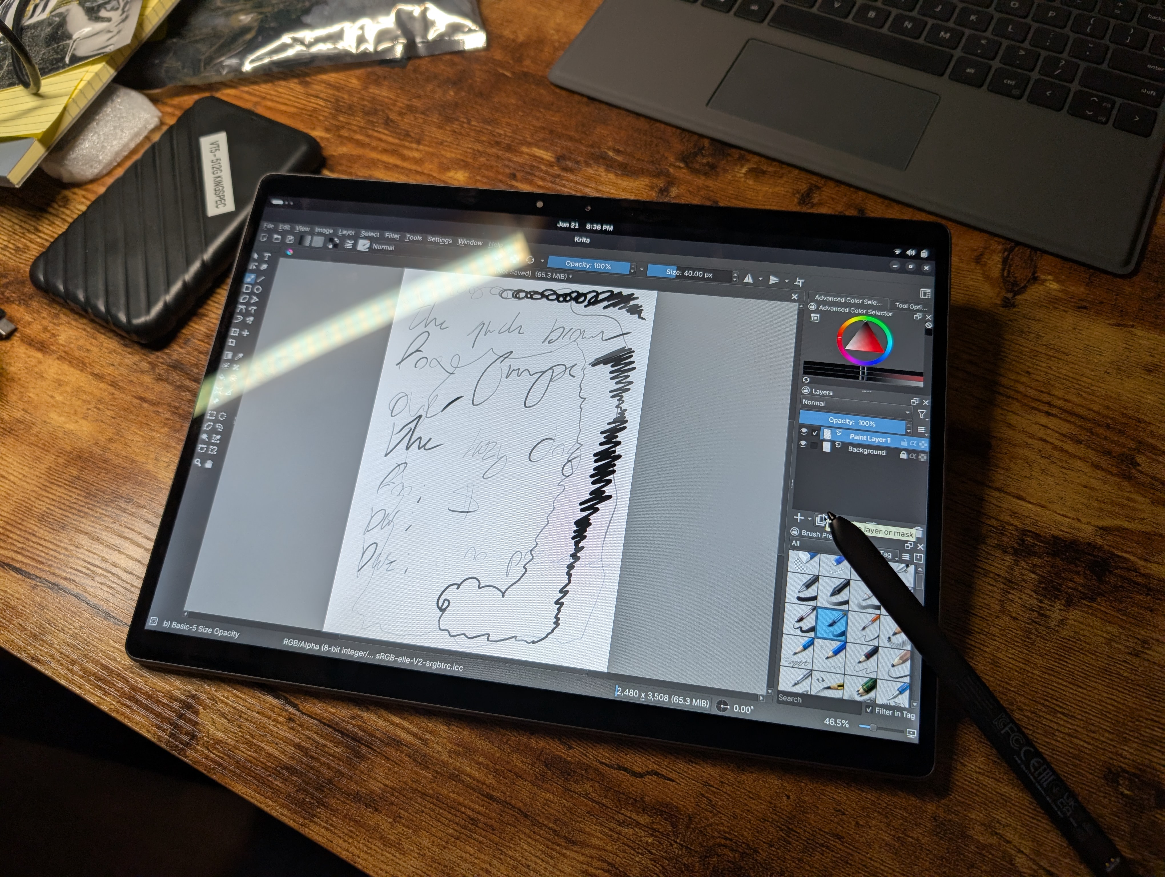 The Latitude tablet displaying Krita in Fedora 42